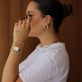 Pulseira corda de violão com bolinhas banhada a ouro 18k