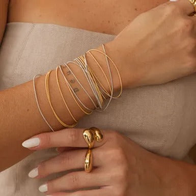 Pulseira corda de violão banhada em ródio branco